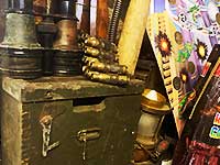 close up corner view of a world war two military storgage box with some war issue binoculars